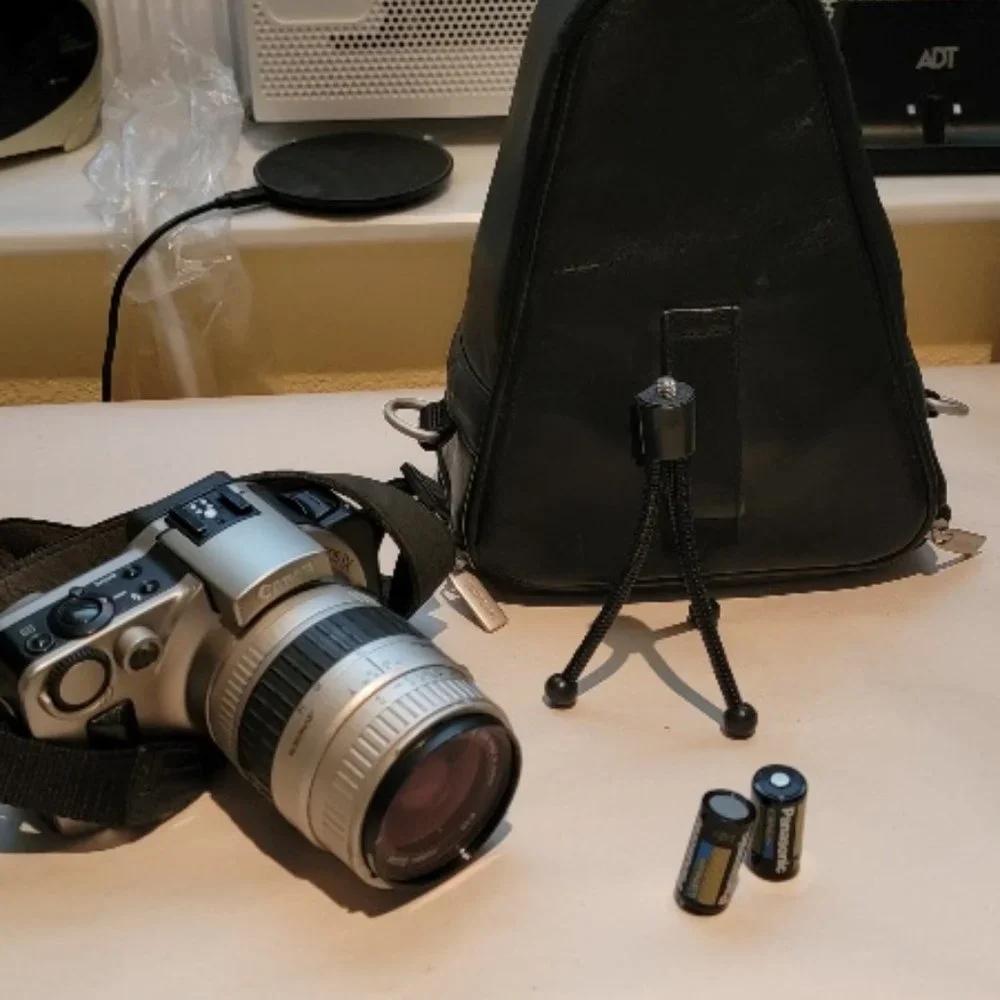 Canon EOS IX Camera With Aspherical Lens Case and tripod